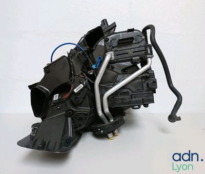 an image of a car engine is shown on a white surface