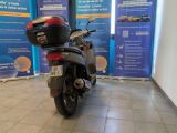 a motorcycle that is parked in a showroom