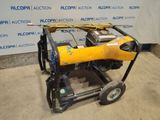 a yellow and black machine sitting on top of a cart