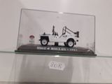 a display case with a model of a truck in it