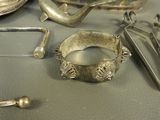 a lot of silver items that are on the table