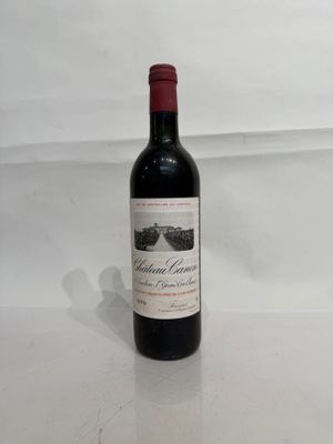 a bottle of wine that is sitting on a table