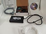 a box with a cable and a cd in it on a table