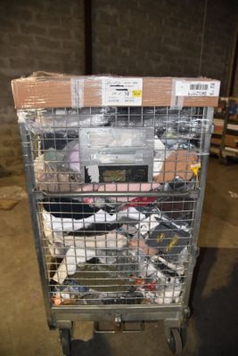 a metal cart with many items in it in a warehouse