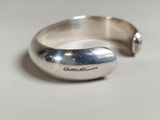 silver plated ring with engraved inscription on the side