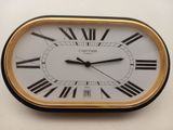 a clock with roman numerals on the face of it