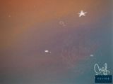 a blurry photo of a plane flying in the sky