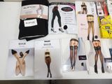 many different types of stockings on display on a table