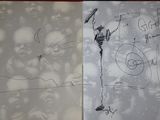 two pages of paper with drawings on them on a table