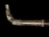 an image of a close up of a cane with a handle