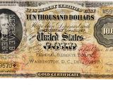 un gros plan d'un ancien billet de banque sur lequel figure le portrait d'un homme