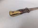 a small knife that is laying on a table