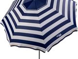 a blue and white striped umbrella on a stand