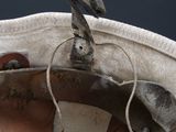 a close up of a pair of shoes and a bag
