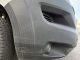 a close up of a car tire on the road