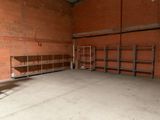 a large room with a lot of shelves and shelves on the wall