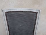 an image of a chair with a window in the back