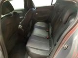 the back seats of a car are empty and the passenger seat is empty