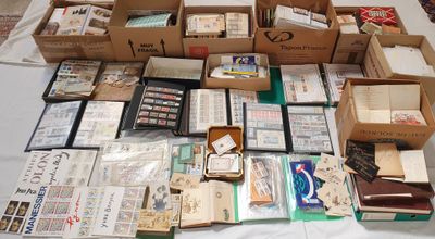 many boxes of books on a table with a lot of them