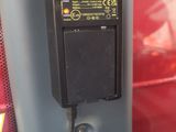 a close up of a parking meter on the side of a street