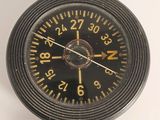a close up of a wrist watch with a black face