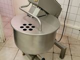 a machine that is sitting on the floor in the kitchen