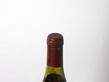 a bottle of wine that is sitting on a table