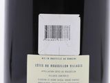 the bottle of wine has a barcode label on it