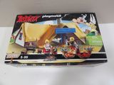the box is open to show the contents of a playmobil set