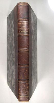 a book that is on the wall next to a lamp