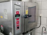 a machine that is sitting on a table in a kitchen
