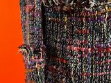 a close up of a woman ' s jacket on a mannequin mannequin mannequin mannequin mannequin mannequin mannequin