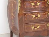an image of a chest of drawers with a marble top