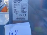 a sign on the side of a machine that has a price tag attached to it