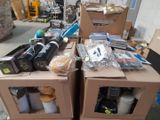 many boxes of items that are sitting on the floor