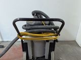 an image of a vacuum cleaner in a room