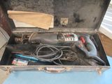 a tool in a case that is sitting on a table