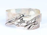 sterling silver ring with flowers and leaves on it