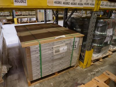 a lot of boxes and pallets in a warehouse