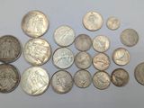 a lot of coins that are sitting on a table