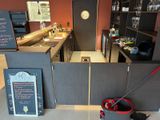 a mop that is sitting on the floor in the kitchen