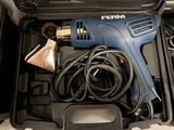 a blue electric drill in a black case