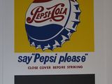 enseigne Pepsi Cola sur le mur d'un restaurant aux États-Unis