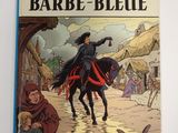 un livre sur lequel figure l'image d'une femme à cheval