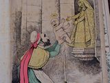 an old book with a picture of a woman and a man