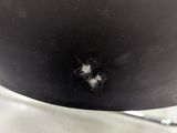 a large black pot sitting on top of a white counter