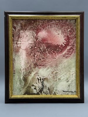 tableau représentant une œuvre abstraite rouge et blanche dans un cadre doré