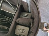 a bag that has a bunch of electronics inside of it