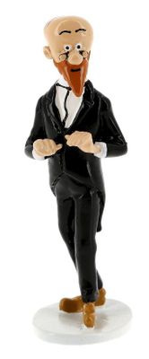 a figurine of a man in a tuxedo