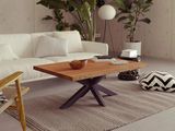 a living room with a white couch and a wooden coffee table